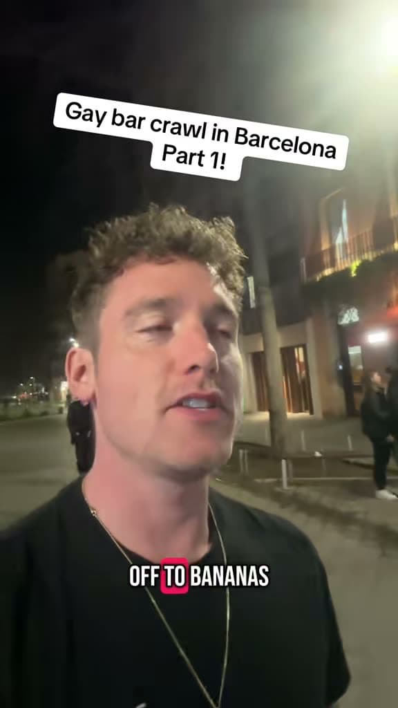 Chris on a Barcelona street at night; the title card reads Gay bar crawl in Barcelona Part 1